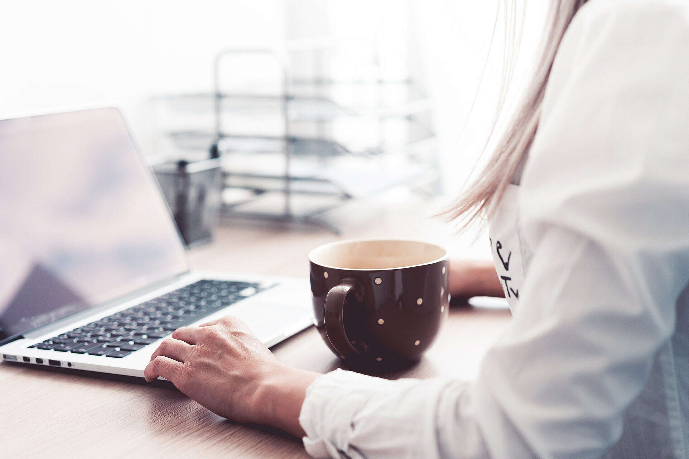 Woman Working and Drinking Tea in The Office Free Stock Photo picjumbo