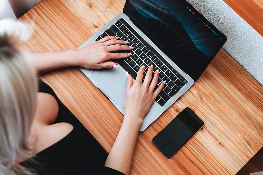 Woman Working on MacBook