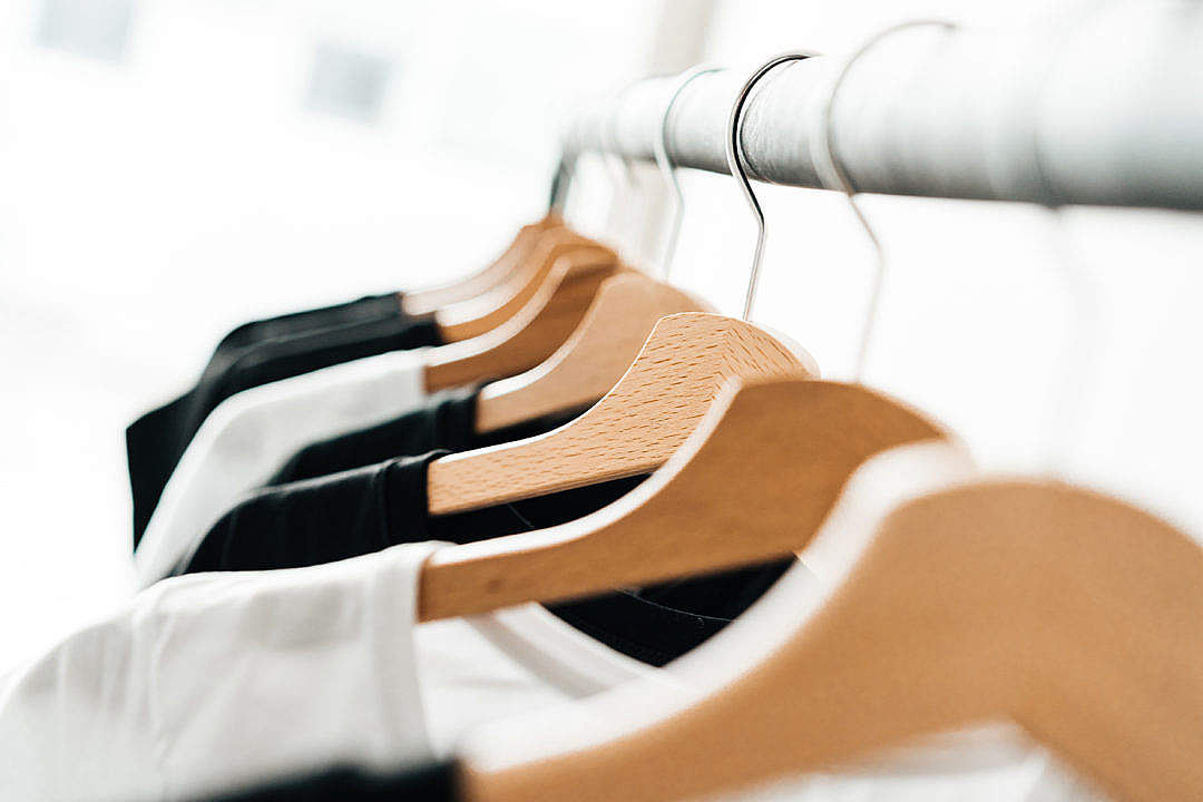 Download Wooden T-Shirt Hangers in Fashion Apparel Store FREE Stock Photo