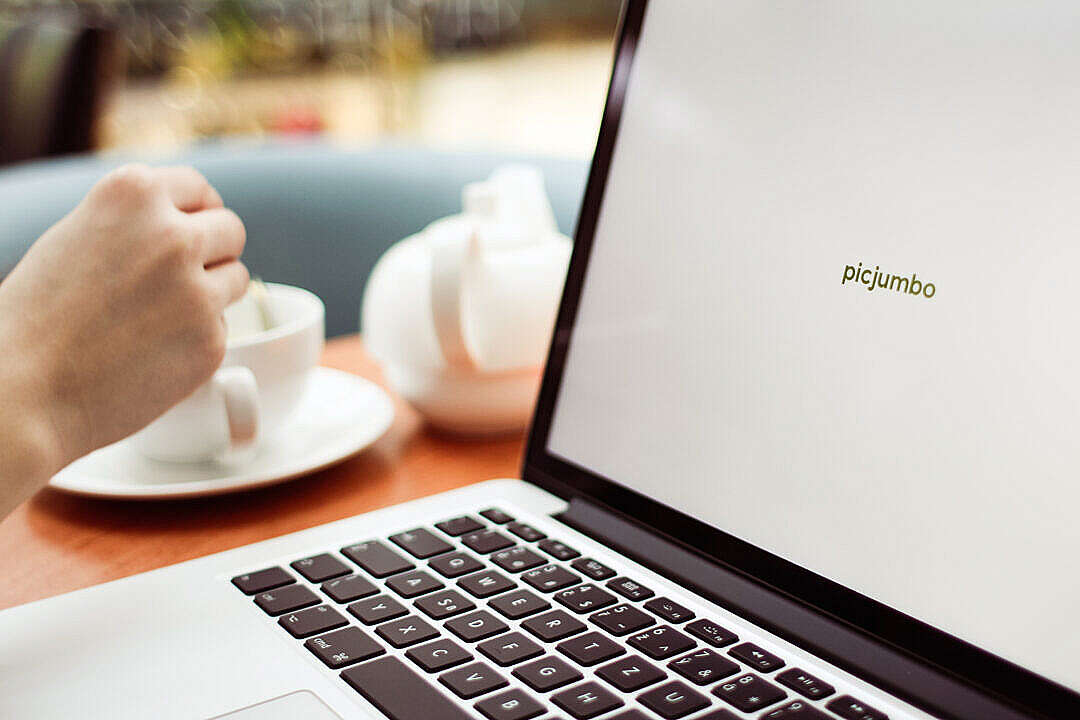 Download Work on a MacBook Close Up FREE Stock Photo