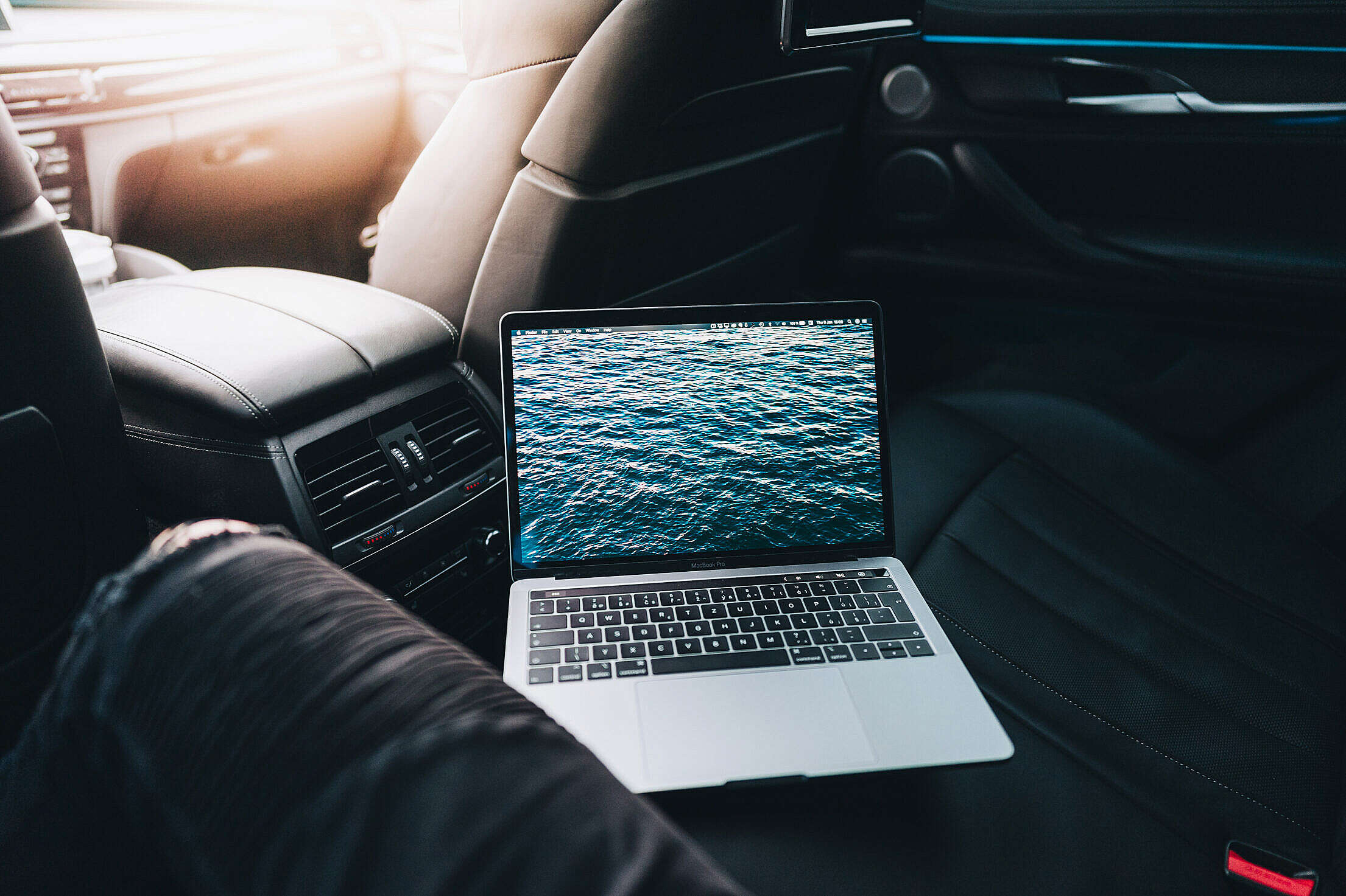 Working on a Laptop from a Car Free Stock Photo