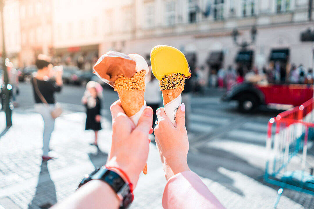 Download Young Couple Enjoying an Ice Cream FREE Stock Photo