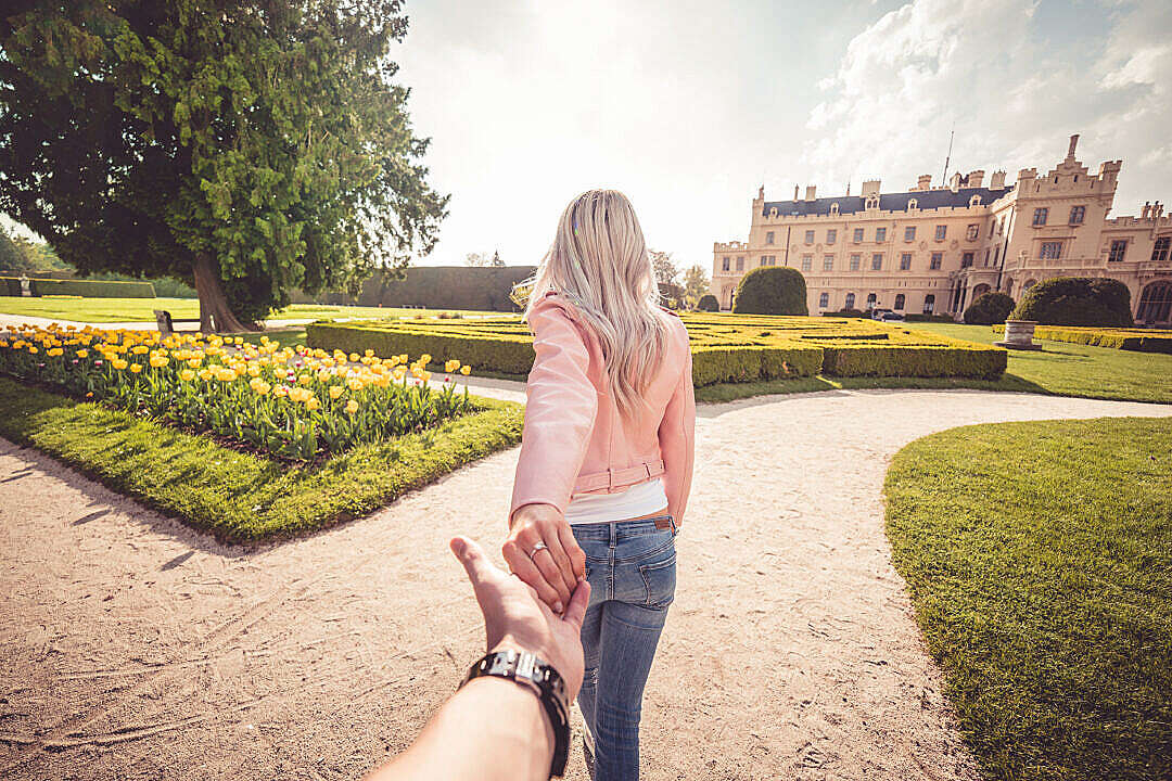 Young Couple Enjoys Walking in Chateau Garden #followmeto