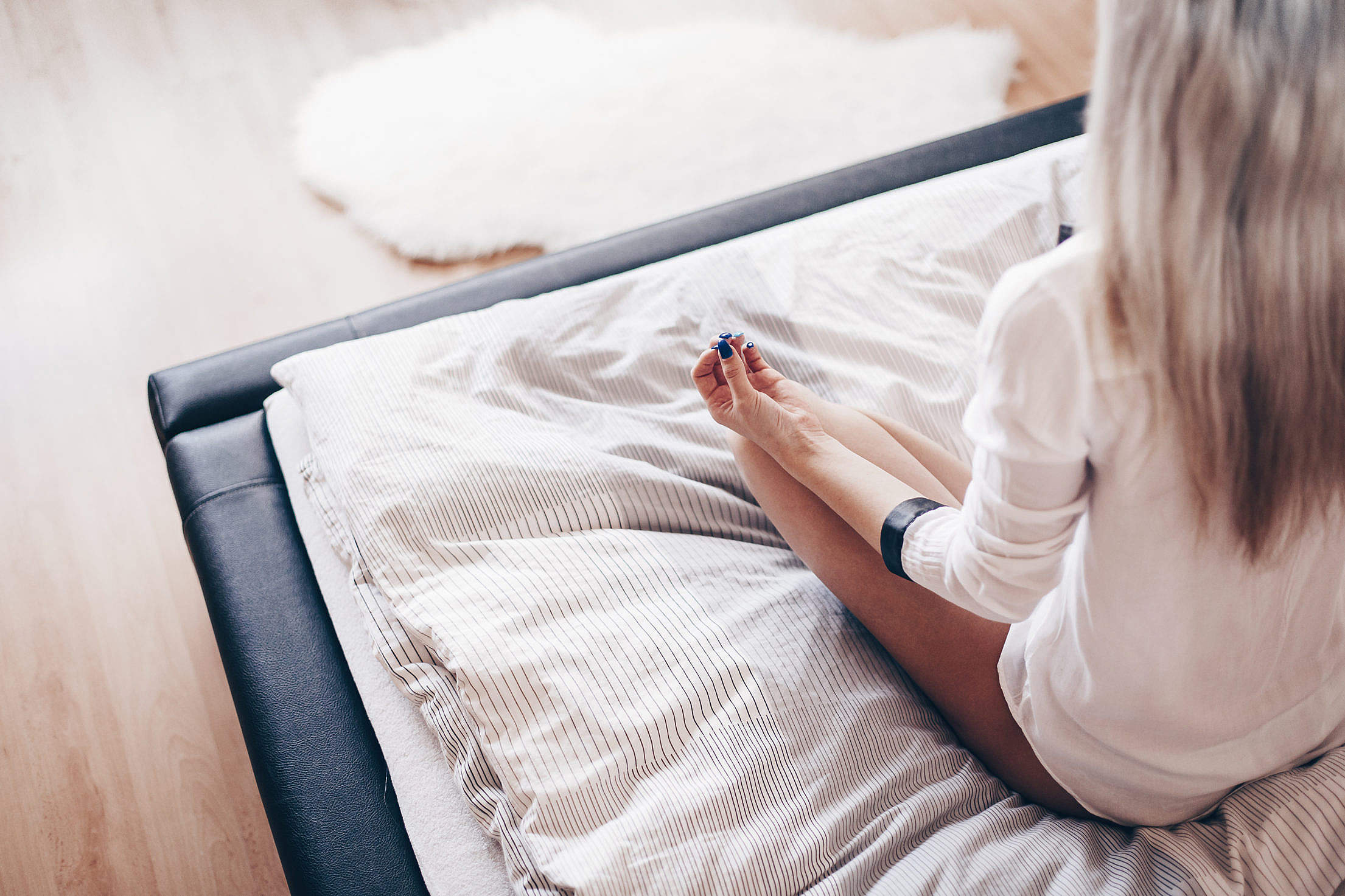 Download Young Girl Starting New Day with Meditation in Her Bed Free Stock Photo