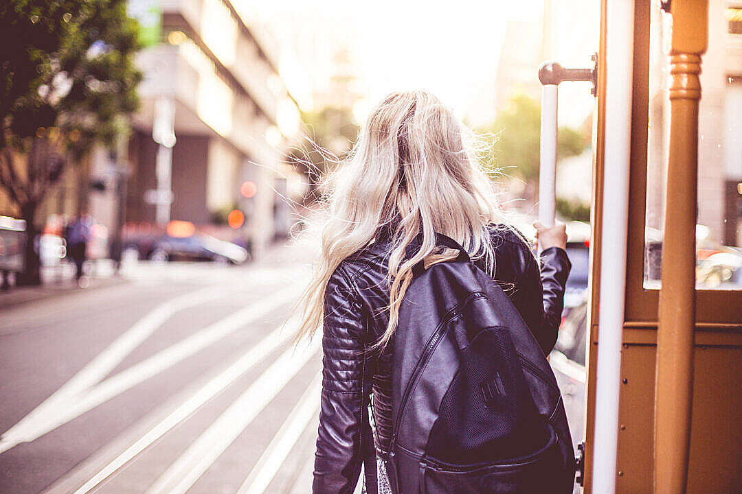 Young Woman Enjoying Ride on The Iconic Cable Car in San Francisco