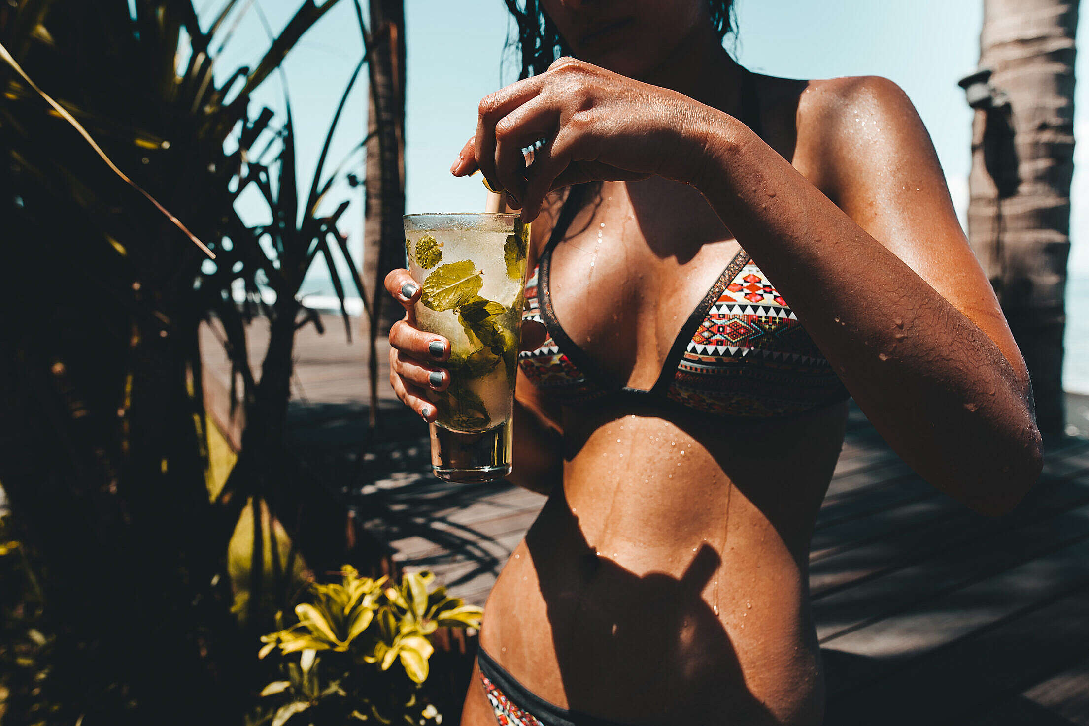 Young Woman Enjoying Summer Vibes in Beach Bar Free Stock Photo