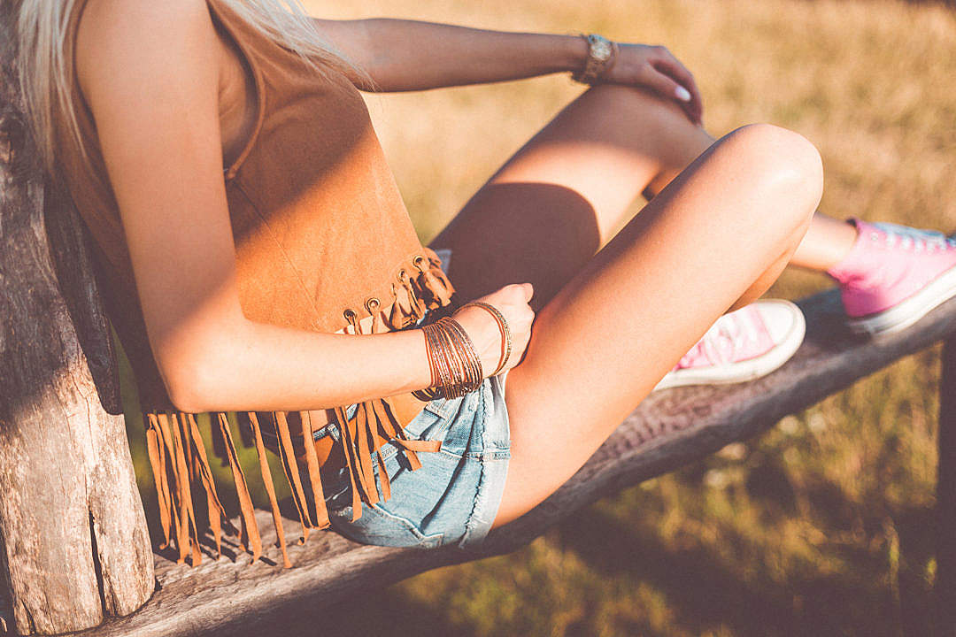 Young Woman Enjoying Sunset in Boho Style