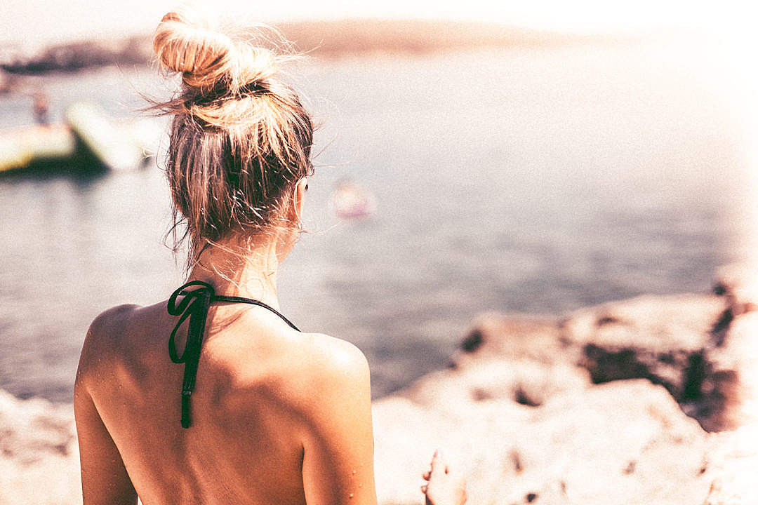 Young Woman in Swimsuit Standing Near Sea