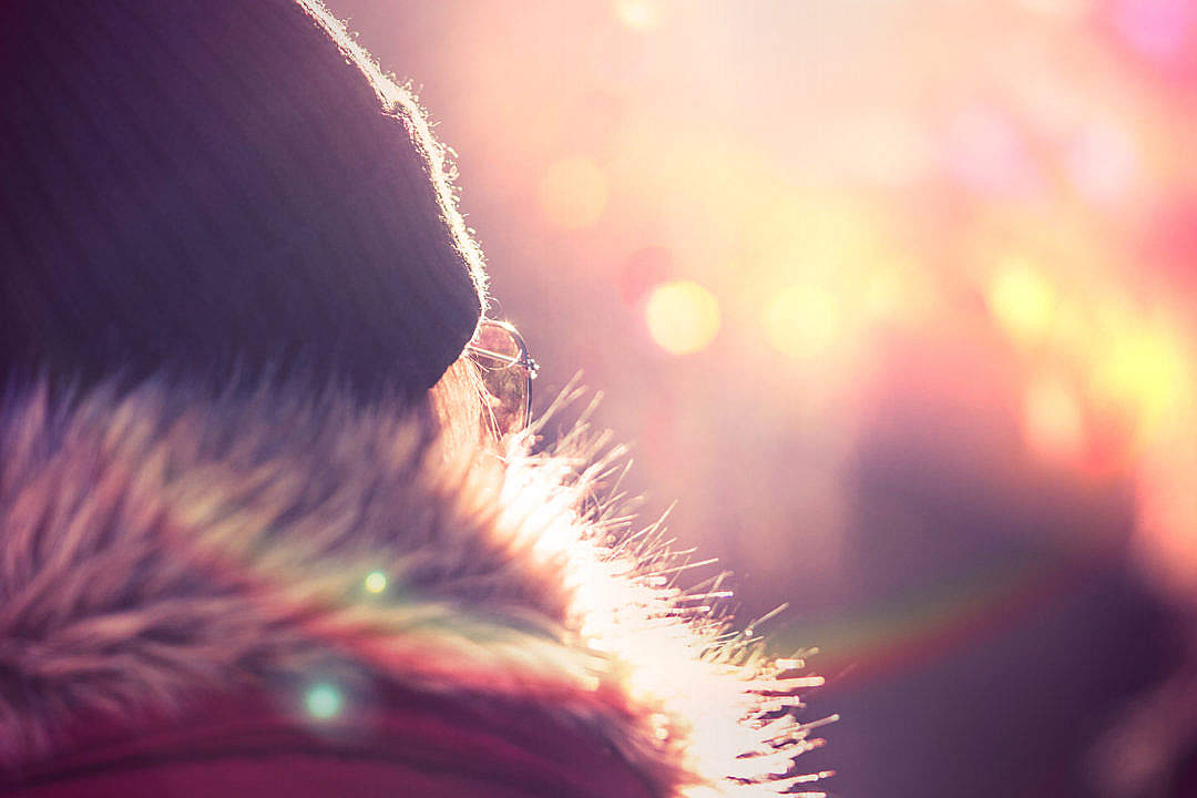 Download Young Woman in Winter Jacket and Hat FREE Stock Photo