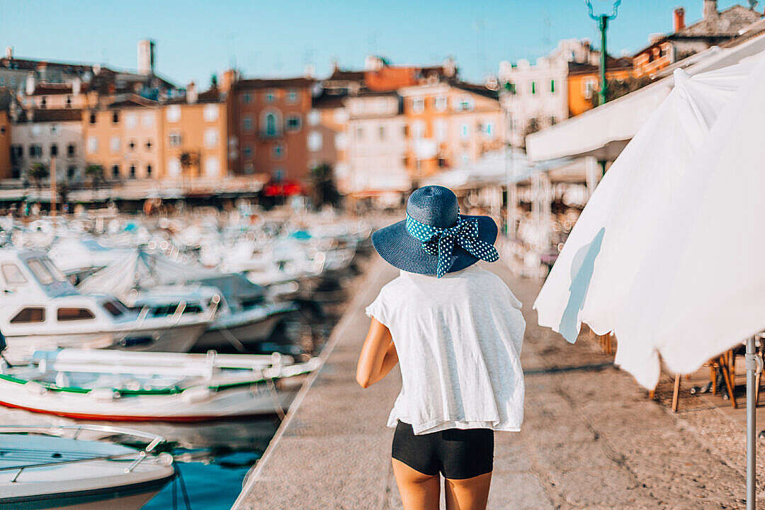 Young Woman Walking Around The Harbor in Croatia