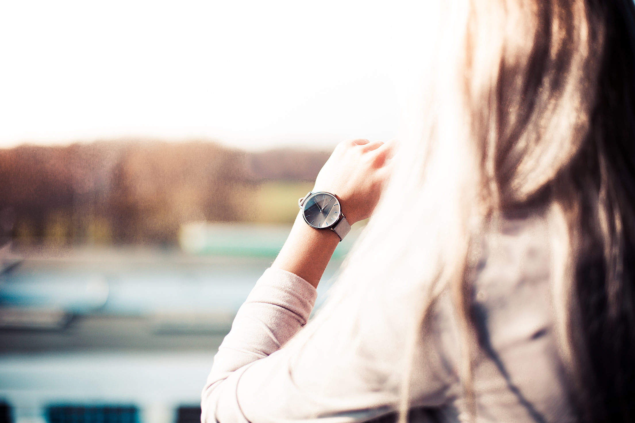 Young Woman with Gray Fashion Watches Enjoying Views Free Stock Photo