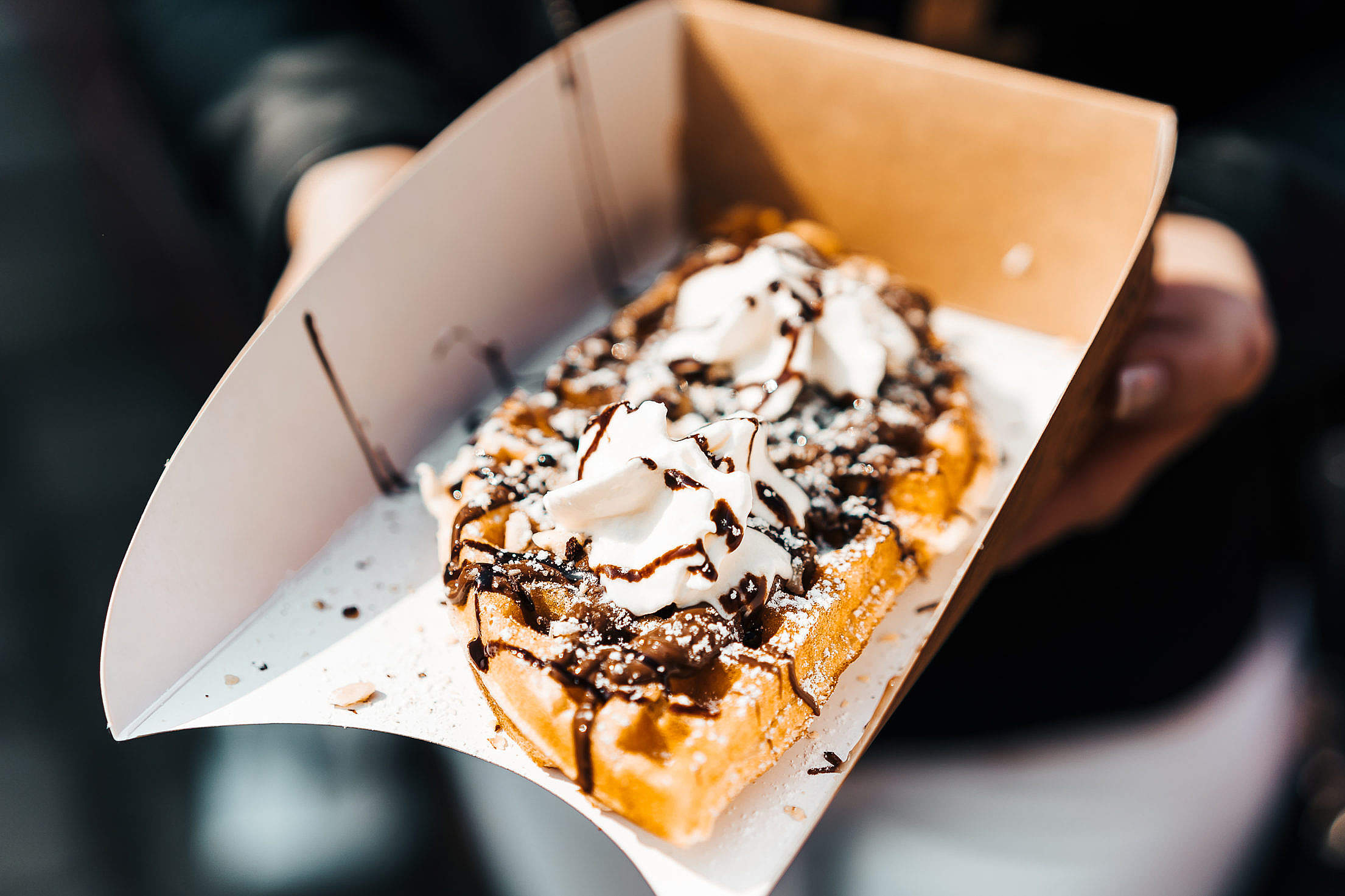 Download Yummy Chocolate Waffles from Open Air Food Market Free Stock Photo